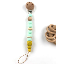 Cargar imagen en el visor de la galería, Chupeteros Silicona y madera Anillas Mostaza y Mint