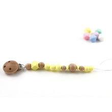 Cargar imagen en el visor de la galería, Chupetero madera y silicona amarillo bebé