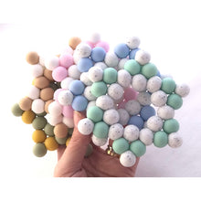 Cargar imagen en el visor de la galería, Mordedor estrella varios colores