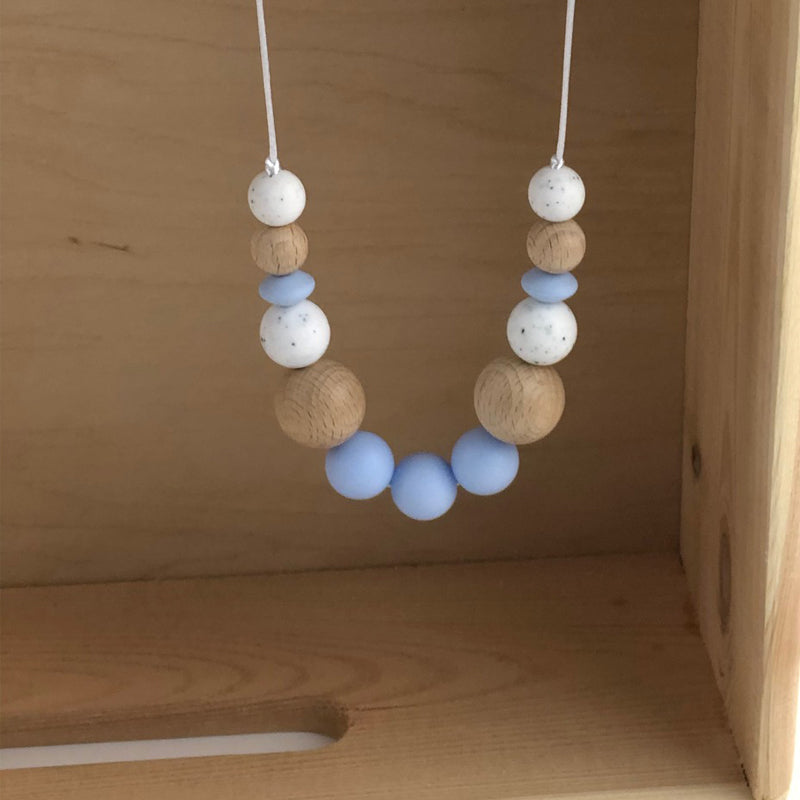 Collar de lactáncia madera y silicona azúl