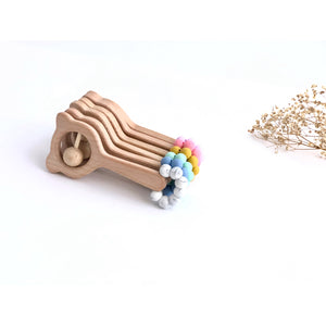 Sonajero mordedor de madera y silicona diferentes colores